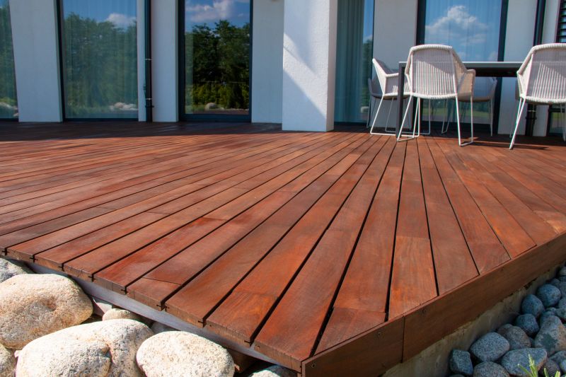 Staining protects wood from moisture and UV damage, prolonging its life.
